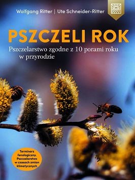 Książka, której okładką jest zdjęcie pąków drzewa oraz zbierających pszczół. na górze białym kolorem są wypisani autorzy, a poniżej żółtą barwą tytuł: "Pszczeli rok", a podtytuł "Pszczelarstwo zgodne z 10 porami roku w przyrodzie".