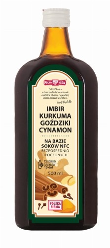 Polska Róża- Napój imbir, kurkuma, goździki cynamon. Szklana butelka z ciemnego szkła. Na etykiecie znajduje się informacja o naturalnym składzie, o pojemności 500 ml oraz grafiką imbiru, kurkumy, cynamonu i goździków.